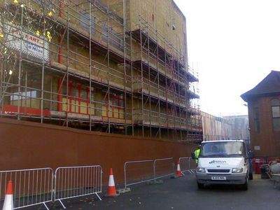 Bus Garage Scaffolding Next to Church
